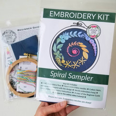 Beginner Embroidery kit for adults with spiral sampler design, including hoop, floss, and instructions. Designed by Jessica Long Embroidery.
