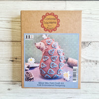 Corinne Lapierre wool mix felt craft kit for folk embroidered hedgehog on a wooden surface. Available at tinypatio.com