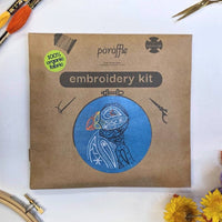 The Paraffle kraft kit envelope printed with the puffin design, laid flat with an organic fabric sticker in the corner